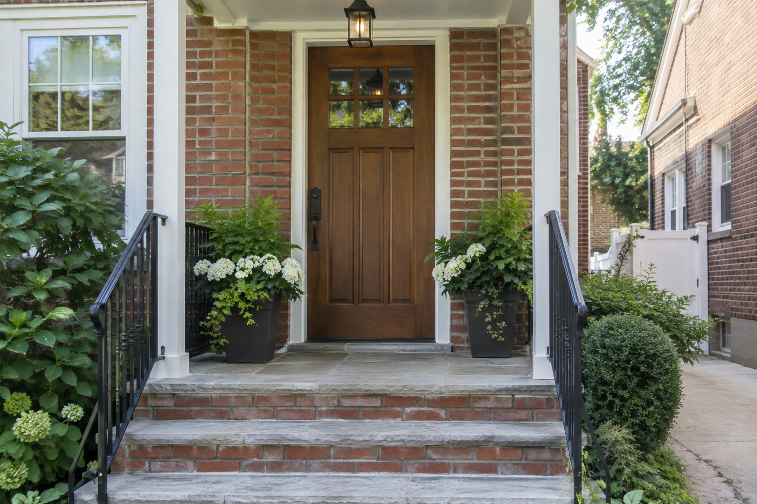 A northeast Queens entryway with a wood front door